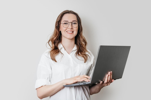 Woman psychologist with a laptop on a white background