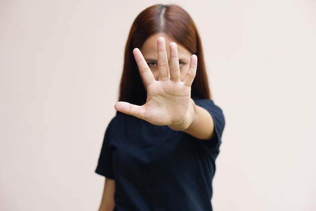 Woman raised her hand for dissuade campaign stop violence against women