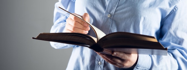 Woman reading book the concept of education