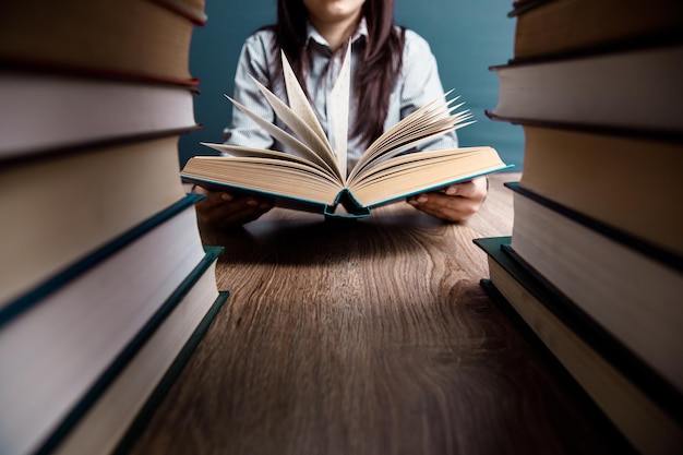 Woman reading book on the table backgroundxA