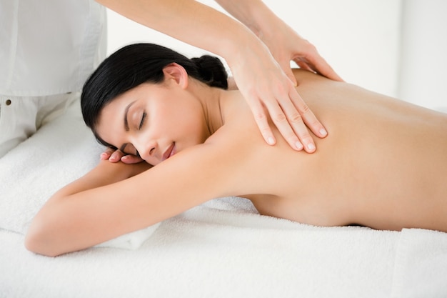 Woman receiving a back massage