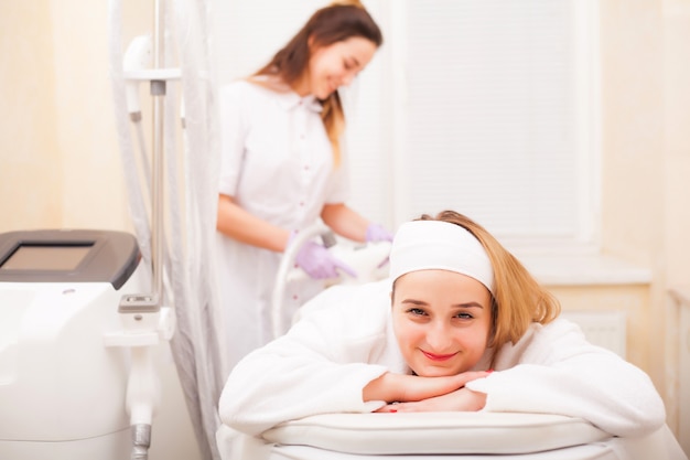 Woman receiving LPG massage at a professional beauty studio.