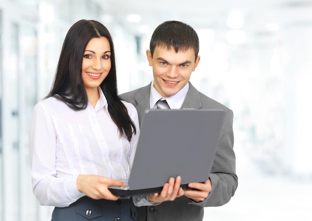 Woman receptionist with a laptop