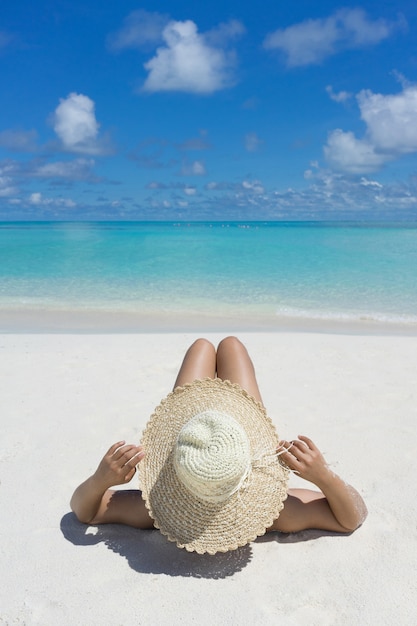 Woman in relaxation on tropical beach