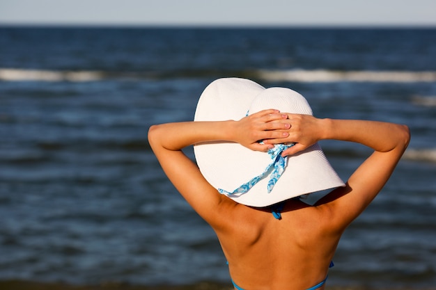 Woman relaxing on the beach