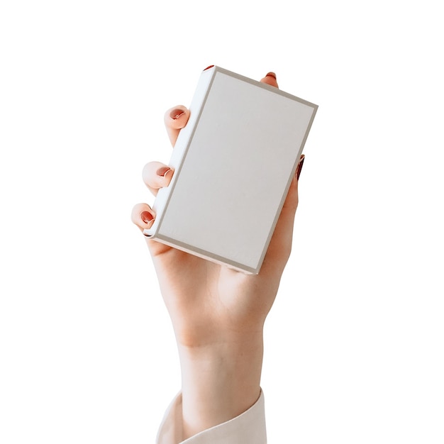 A woman's hand holding a small white box on a white background