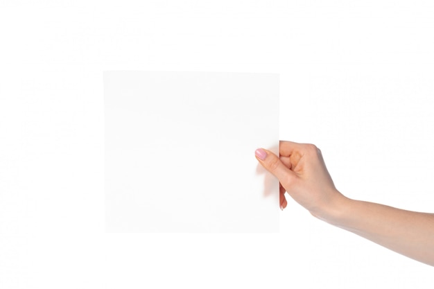 Woman's hand showing white paper isolated on white