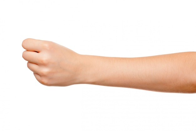 Woman's hand with fist gesture isolated on white