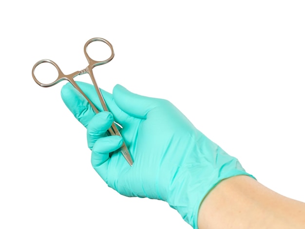 Woman's hand with medical tool in the white background