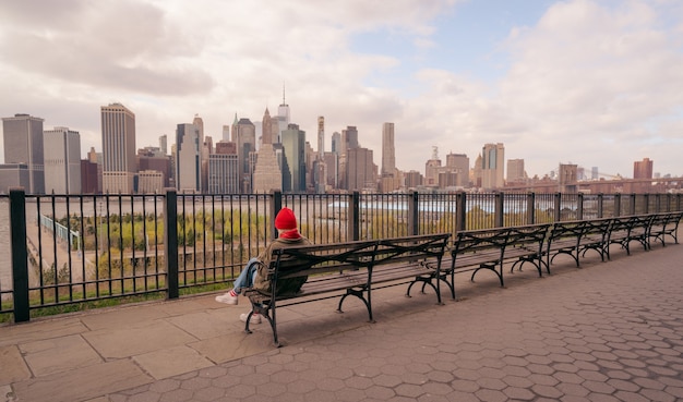 woman seat panorama skyline new york