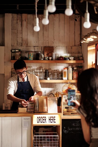 Woman Secretly Filming Barista