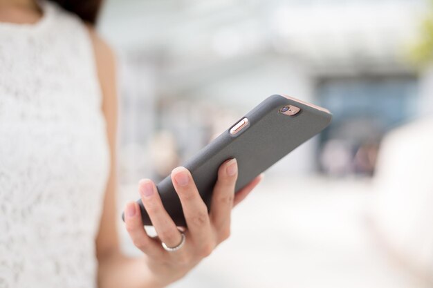 Woman sending message on phone