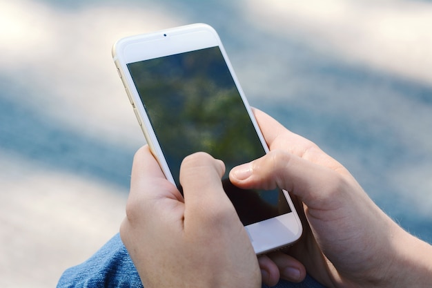 Woman sending messages with her smartphone.