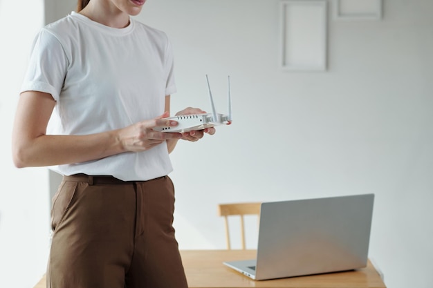 Woman Setting Wifi Router