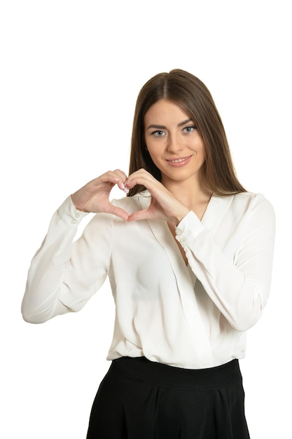 Woman shaping heart symbol