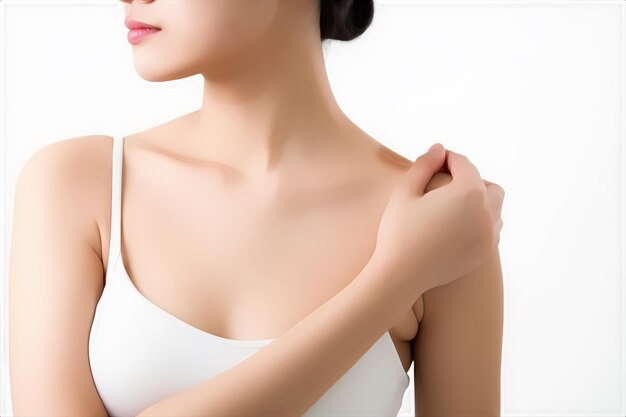 A woman shoulder pain and holding her shoulder