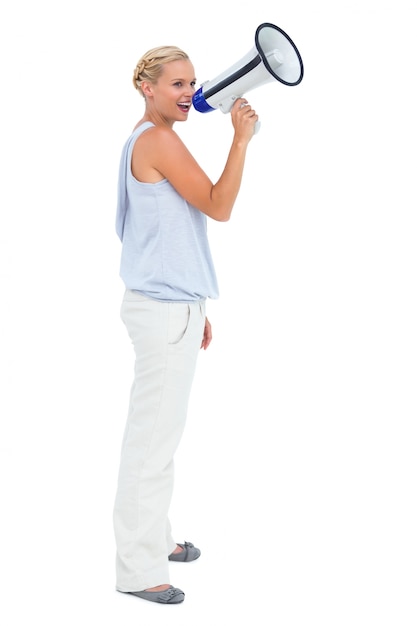 Photo woman shouting through megaphone