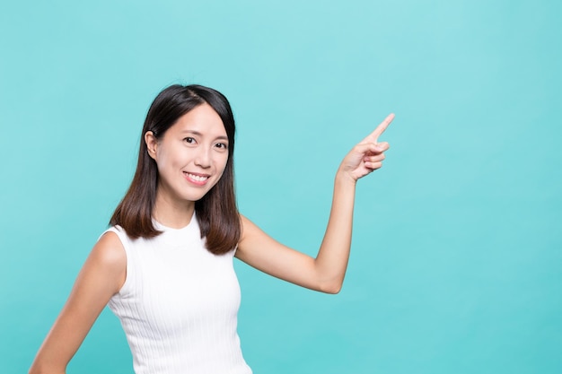 Woman showing finger pointing up