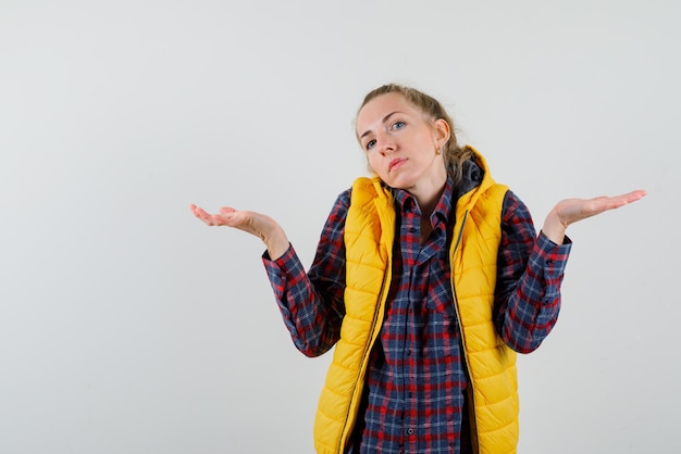 Woman shows with hands emotion not in the know