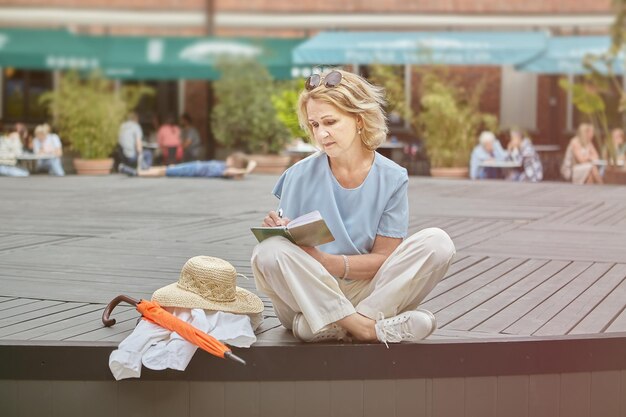 Woman sitting on book