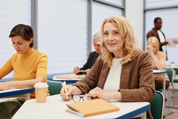 Woman sitting at class at training