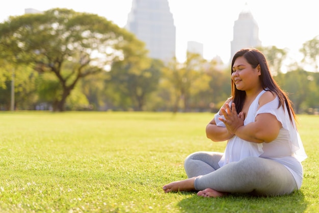 Woman sitting on field