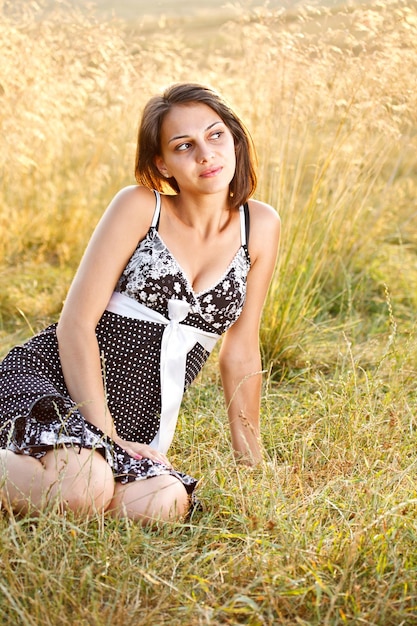 Woman sitting on the grass