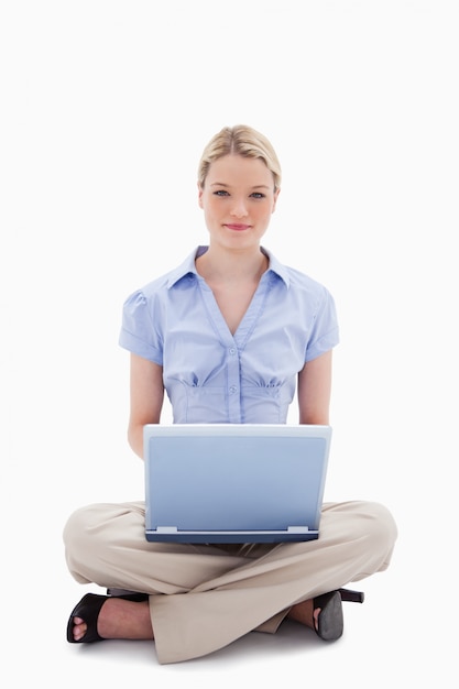 Woman sitting with her laptop