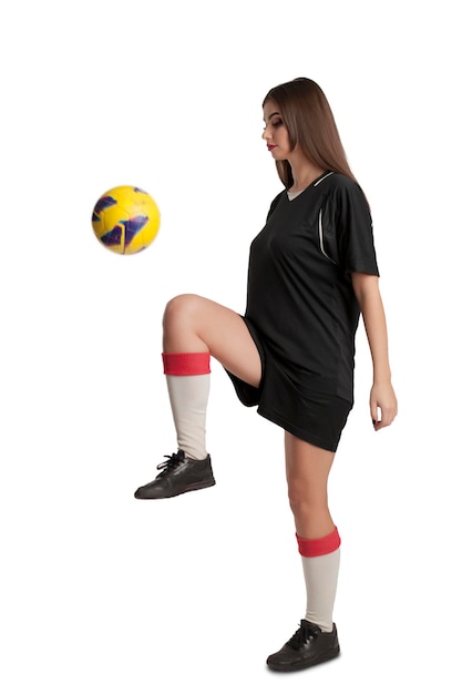 Woman soccer player with soccer ball on white background