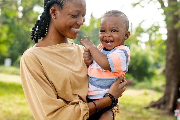 Woman spending time with her black baby boy