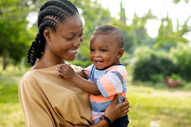 Woman spending time with her black baby boy