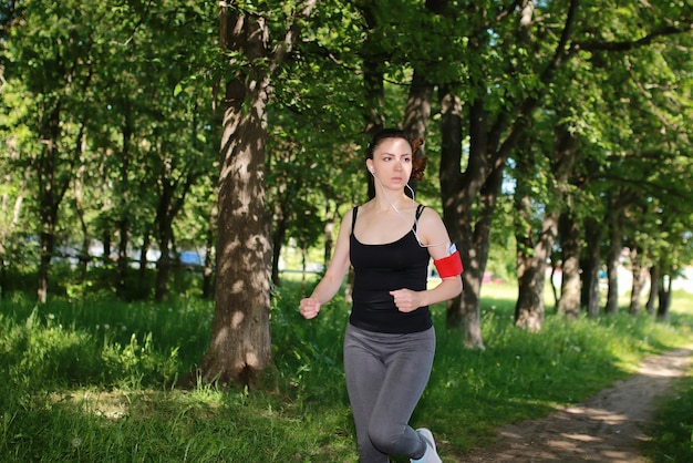 Woman sport run in park outdoor