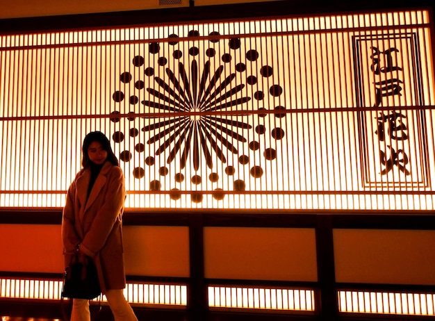 Woman standing against railing japanese sexygirl