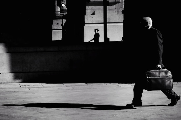 Woman standing against wall