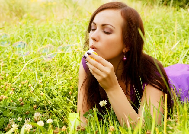 Woman  starts soap bubbles 