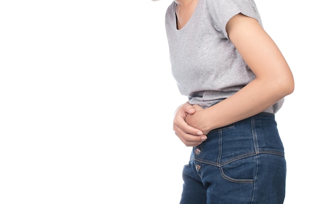 woman suffer from stomachache isolated on white background