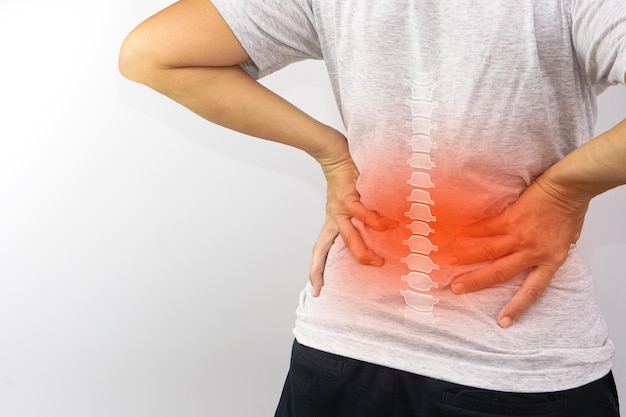 Woman suffering from waist backache or hip pain Backache office syndrome and health concept