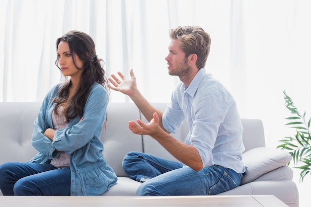 Woman sulking while her partner is talking to her