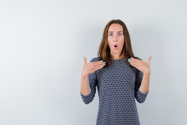 Woman surprising on white background