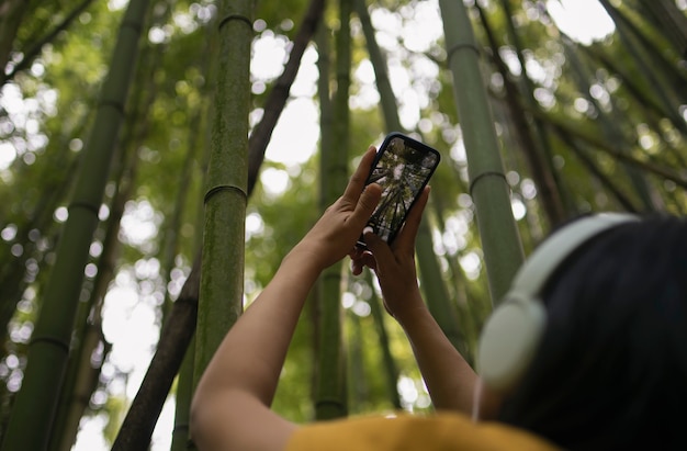 woman taking photos with the smartphone