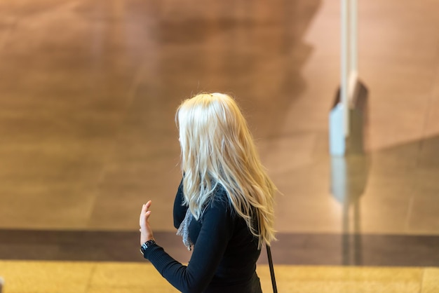 Woman talking on the phone. Unrecognizable, real people.