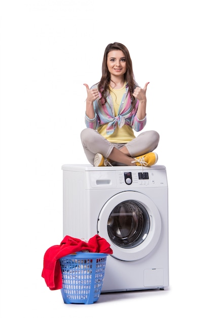 Woman tired after doing laundry isolated on white