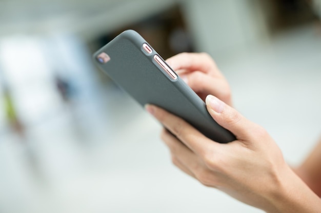 Woman touch on mobile phone