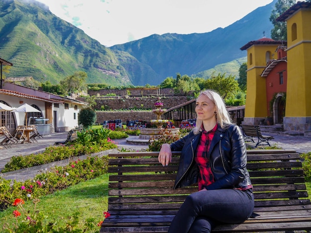 Woman tourist in a village in the Sacred Valley of the Incas in the city of Cusco