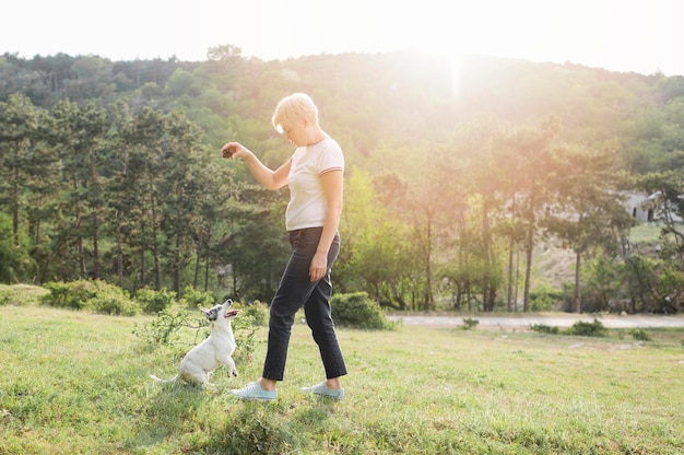 Woman training companion in the park