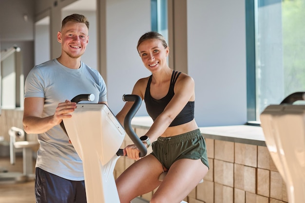 Woman training together with coach