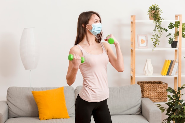 Woman training with mask