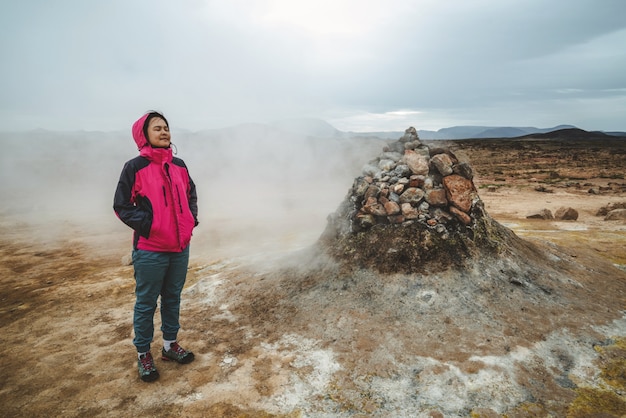 Woman traveler at Hverir, Namafjall in Iceland