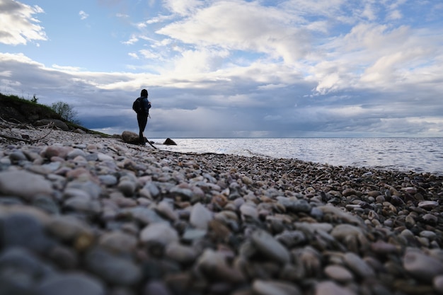 Woman traveling along the shore