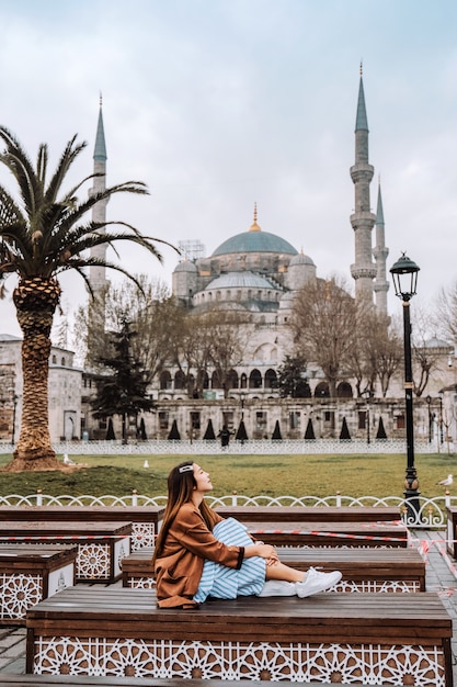 Woman traveling in Istanbul Blue mosque, Turkey